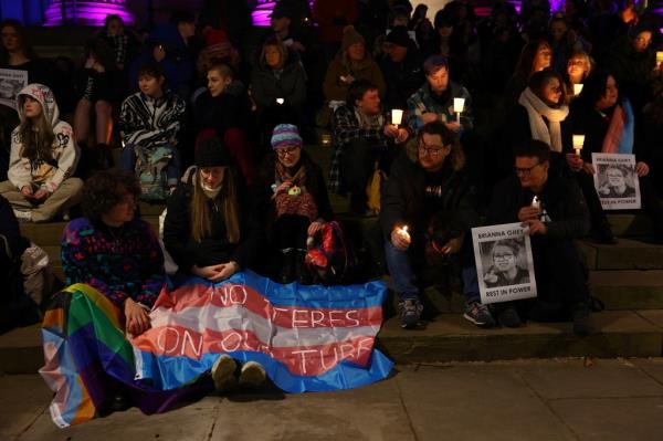People attend a vigil in memory of Ghey on February 14.