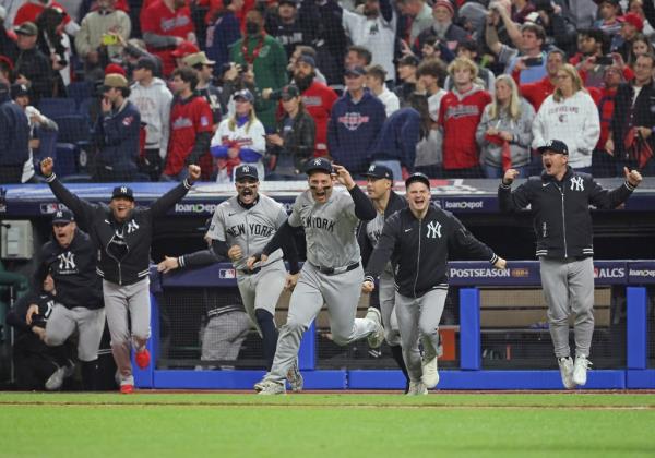 The Yankees poured out of the dugout after the final out.