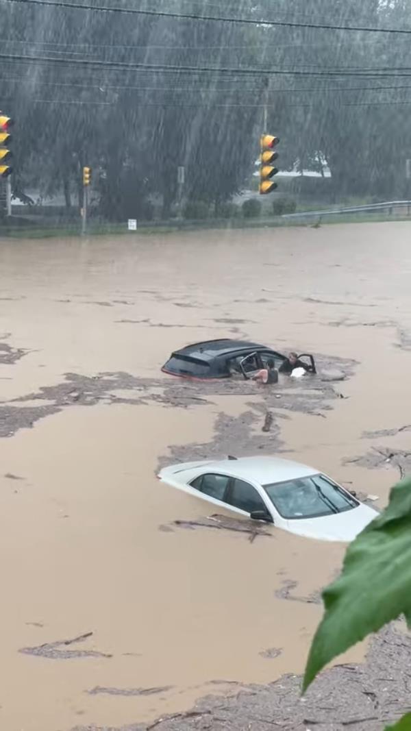 A stranded motorist and his dog were rescued in the town of Southbury, Connecticut, on Sunday, August 18, as severe flash flooding hit parts of the region.