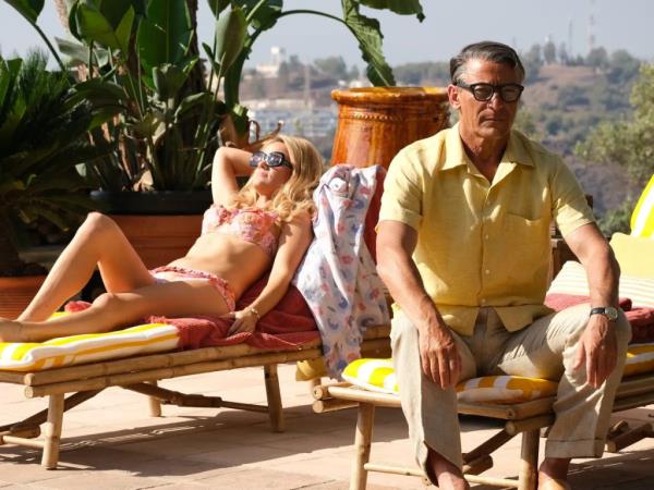 Jason Issacs as Cary Grant and Laura Aikman as Dyan Cannon. 