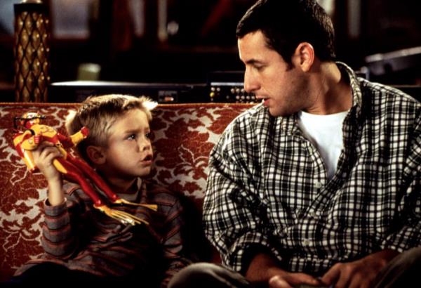 Cole Sprouse with Adam Sandler. 