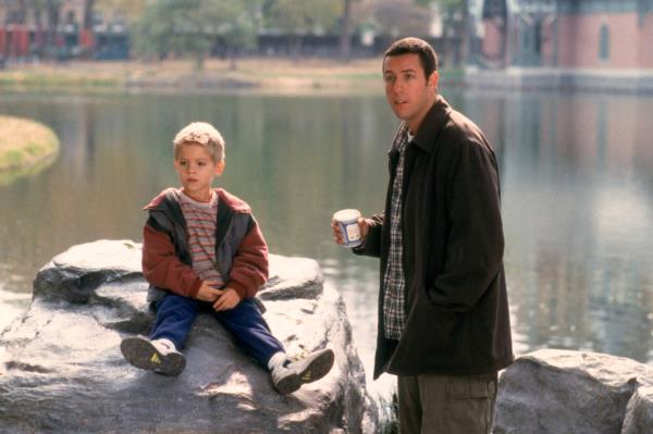 Cole Sprouse and Adam Sandler in 1999. 
