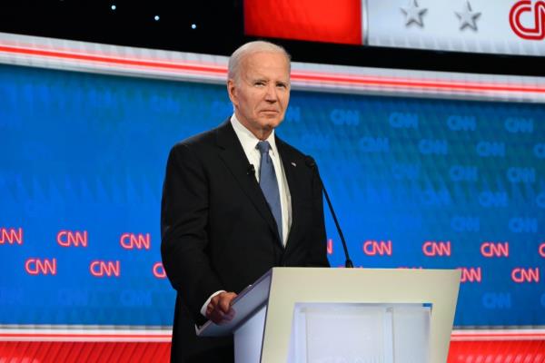 Presidents Joe Biden and Do<em></em>nald Trump participating in a debate at CNN Studios, Atlanta, Georgia