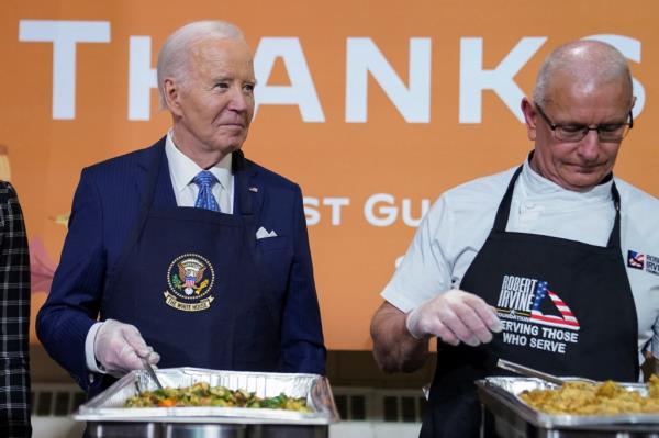 Biden scooped out vegetables to members of the Coast Guard and their families.