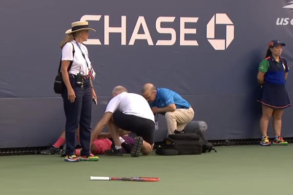 Yoshihito Nishioka collapses at the US Open on Aug. 26, 2024.