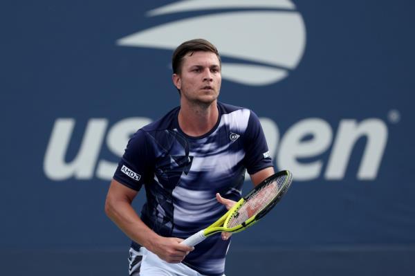 Miomir Kecmanovic of Serbia returning a shot during his Men's Singles First Round match at the 2024 US Open