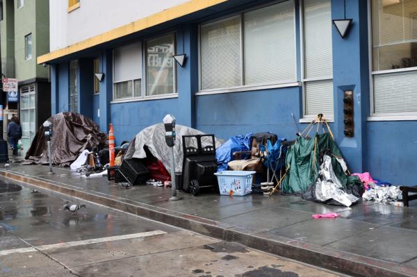 Homeless tents are seen near the Tenderloin District during rainy day in San Francisco on January 13, 2023 as atmospheric river storms hit California, United States.