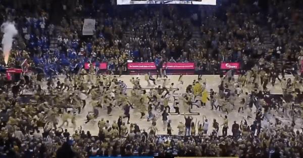 Wake Forest fans stormed the court after the team upset Duke.