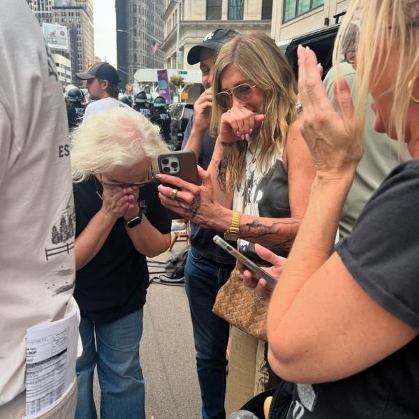 Jennifer Aniston laughing on the set of 