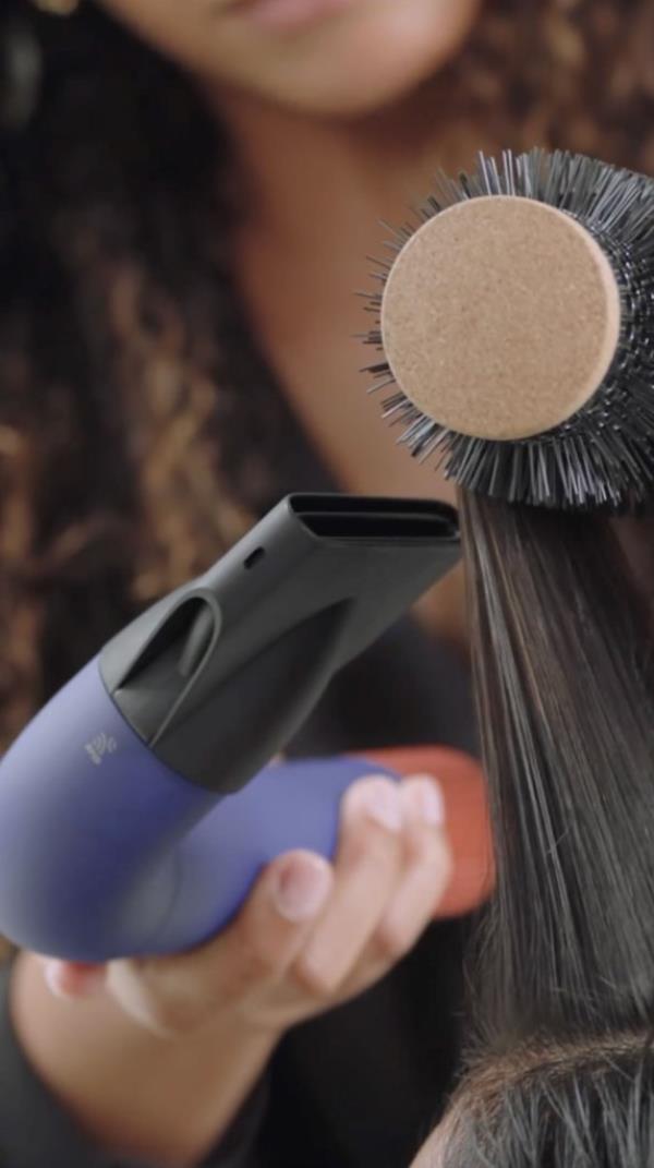 Hairdryer in use