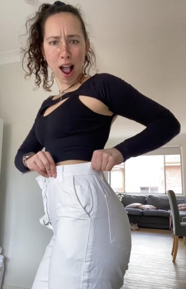 Elizabeth Zemlyanoy on TikTok in white pants