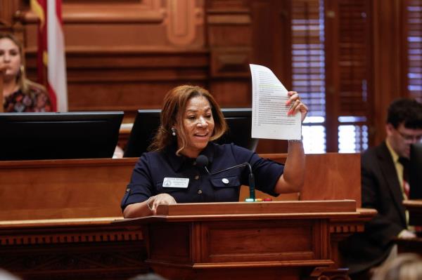 Rep. Mesha Mainor, R-Atlanta, speaks in favor of Senate Bill 233 at the Georgia State Capitol on Thursday, March 14, 2024