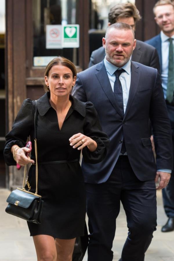 Coleen and Wayne Roo<em></em>ney leave the Royal Courts of Justice 