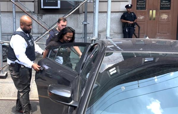 Sanson was arrested after NYPD officers found a cache of weapons in his car.