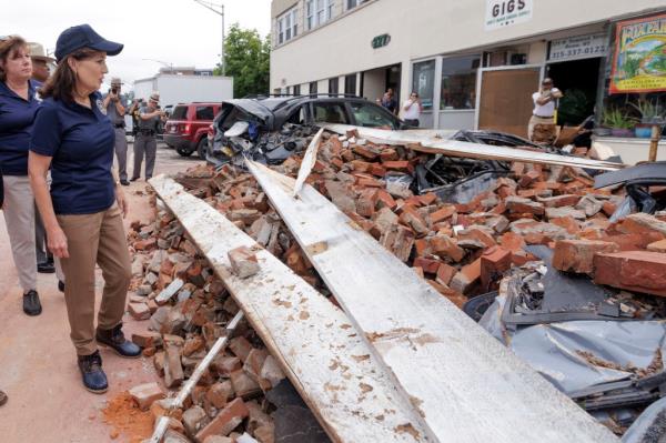 New York Gov. Kathy Hochul surveys tornado damage in Rome, N.Y., on July 17.