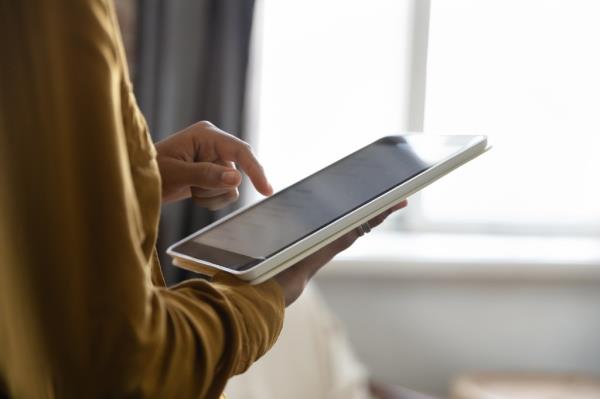 Woman using tablet.