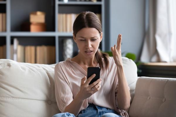 Woman upset at phone.