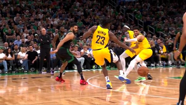 Tyrese Haliburton stumbles in the play that seemingly led to a sore left hamstring injury in Game 2 of Eastern Co<em></em>nference Finals.