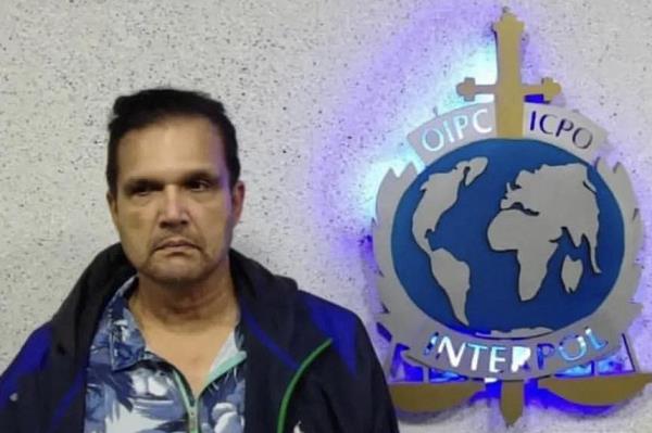 Glenn sits after his capture by Interpol in Maiquetia Venezuela on Sept. 21, 2024.