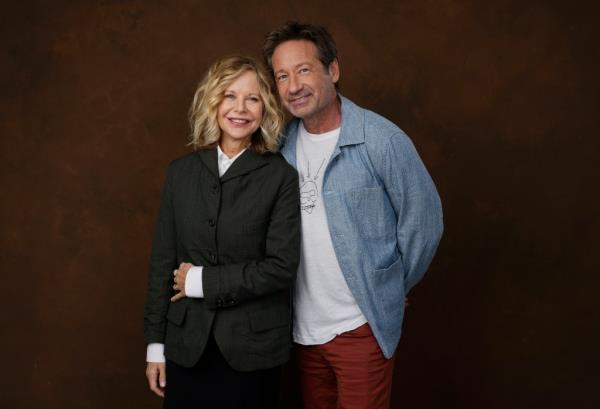 Meg Ryan with David Dochovony, smiling. 