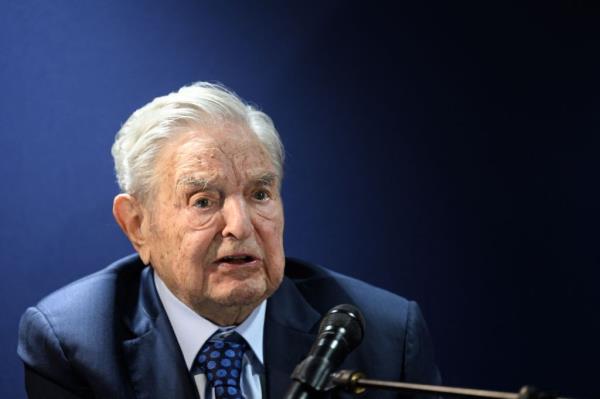 George Soros, Hungarian-born US investor and philanthropist, answering questions after delivering a speech at the World Eco<em></em>nomic Forum meeting in Davos