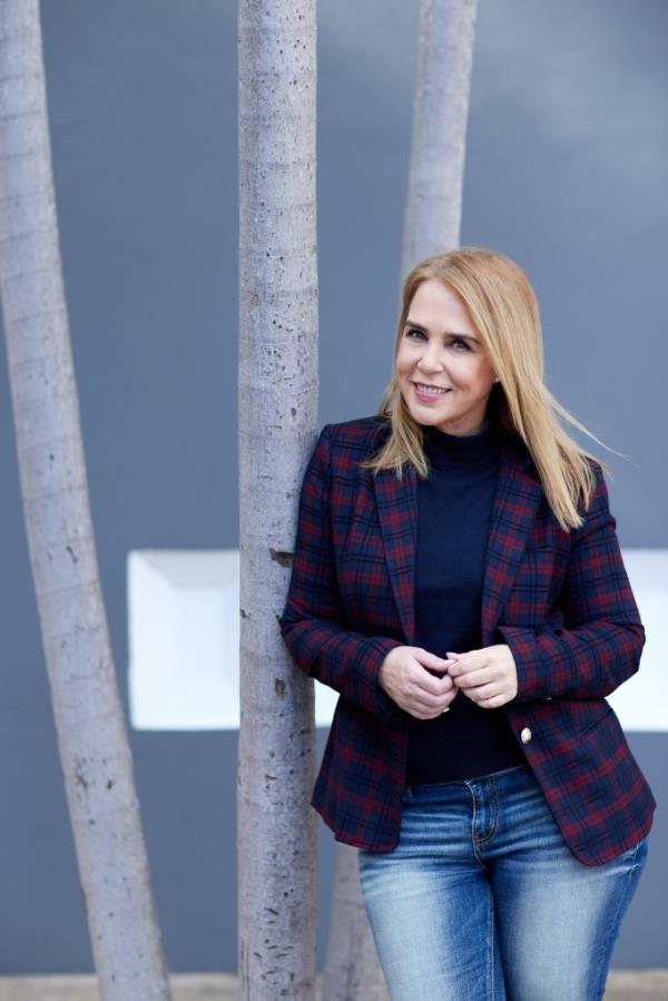 Portrait of journalist Lourdes Ubieta at Americano Media in Miami, taken on December 15th, 2022 by Jeffery Salter for NY Post