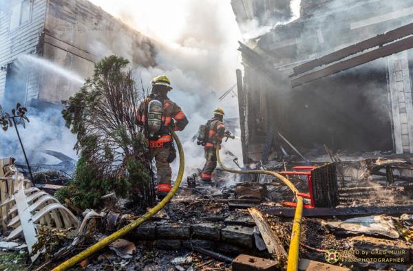 Firefighters attempt to extinguish the fire caused by a small plane crash in Oregon on Aug. 31, 2024.