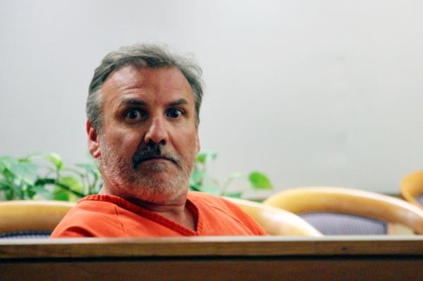 Brian Steven Smith sits in a courtroom while waiting for his arraignment to start in Anchorage, Alaska, Oct. 16, 2019