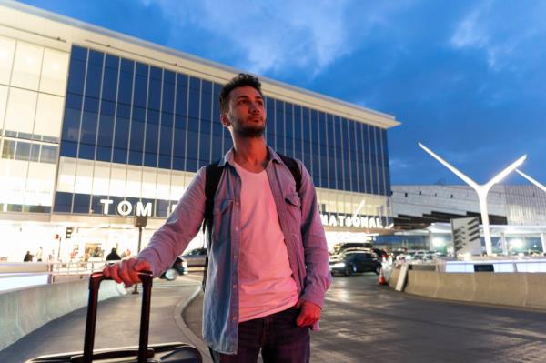 Iranian political activist Mahdi Vatankhah pauses for photos at the Los Angeles Internatio<em></em>nal Airport in Los Angeles
