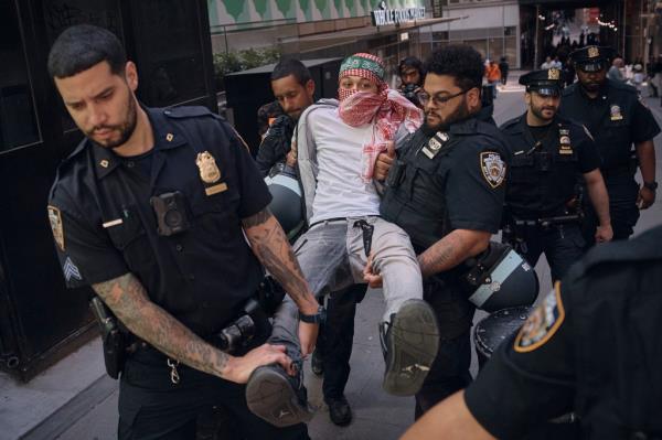 At least 48 people were nabbed by cops, but later released, amid the protests. 