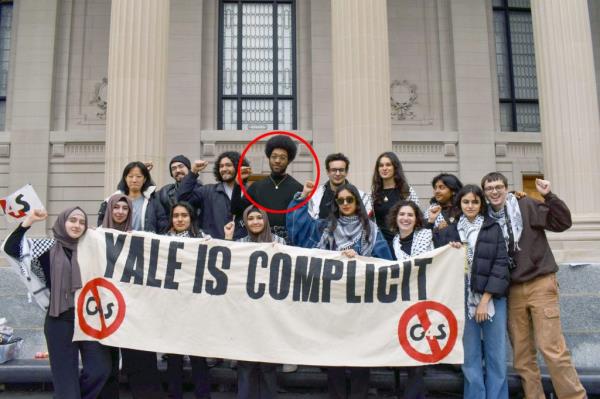 A  group of people standing behind a 