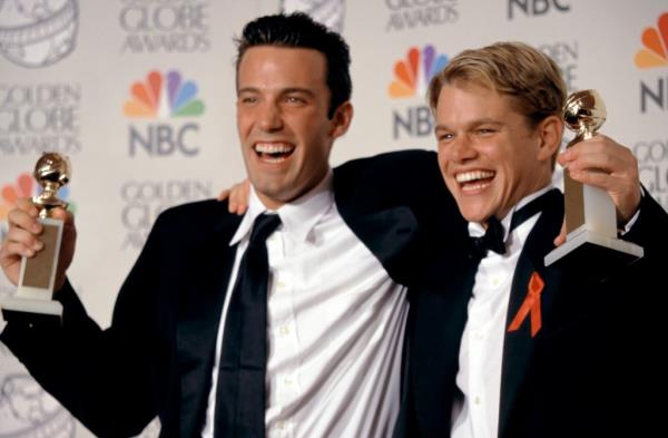 Ben Affleck and Matt Damon hold their Golden Globes in the press room during the 55th Annual Golden Globe Awards on January 18, 1998 at the Beverly Hilton Hotel in Beverly Hills, California. 
