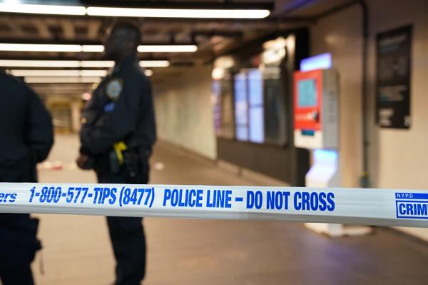 Police at the scene wher<em></em>e a person was fatally stabbed