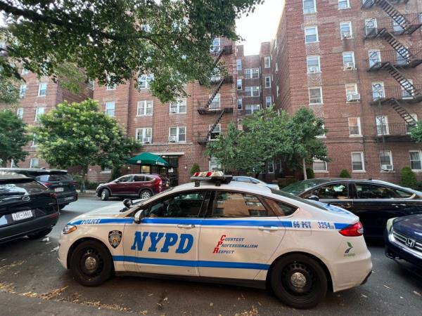 An NYPD cruiser is seen outside the building wher<em></em>e the decomposed bodies were discovered at 40 Tehama Street.