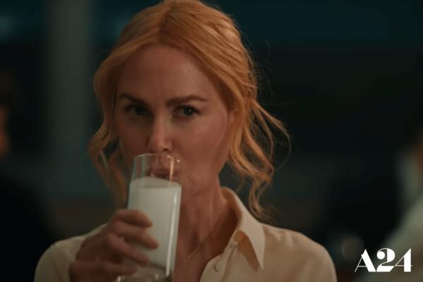 Nicole Kidman drinking a glass of milk