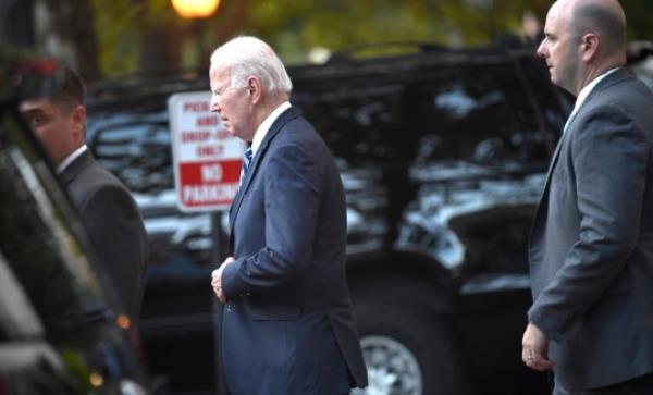 epa10893070 US President Joe Biden departs after services at Georgetown's Holy Trinity Church, in Washington, DC, USA, 30 September 2023. Co<em></em>ngress co<em></em>ntinues debating spending issues as a government shutdown looms. EPA/MIKE THEILER / POOL