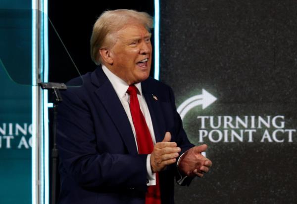 Do<em></em>nald Trump, appeared at a summit hosted by the co<em></em>nservative Christian organization Turning Point Action on Friday without a bandage on his ear.