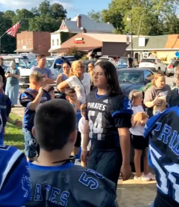 Jase Emily in an undated photo attending a high school football game. 