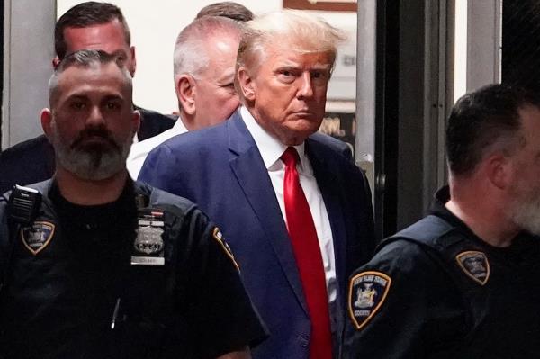 Do<em></em>nald Trump was photographed just briefly while arriving at court in Manhattan earlier this year.