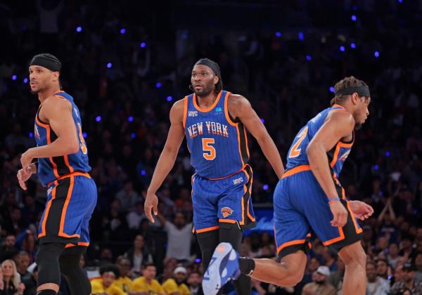 Knicks forward Precious Achiuwa #5 reacts on the court during the second quarter.