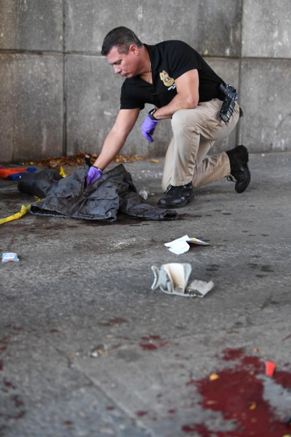 The NYPD respond to a stabbing on 42 St by 1 St Ave.