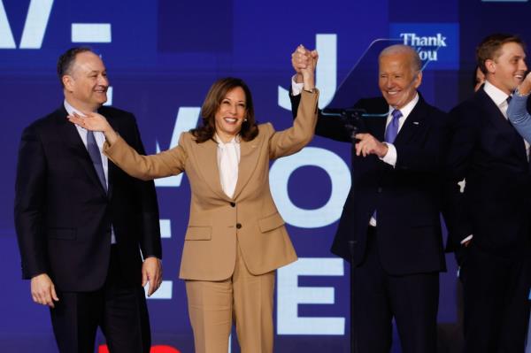Vice President Kamala Harris taking the stage on the first day of the 2024 Democratic Natio<em></em>nal Co<em></em>nvention with President Biden and second gentleman Doug Emhoff.