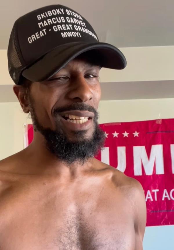 Arrested Skiboky Stora in a hat not wearing a shirt