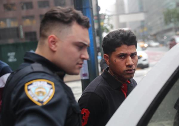 Migrant charged with assault.