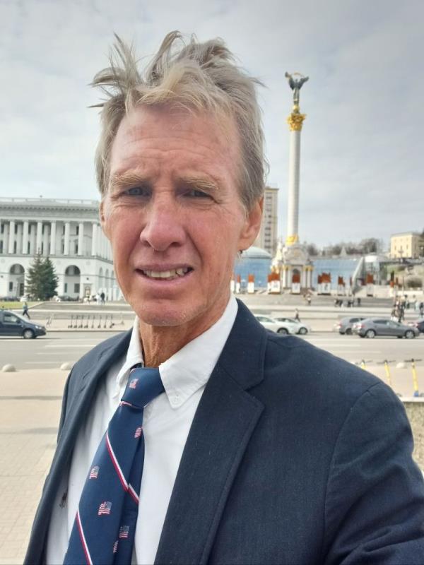 Ryan Wesley Routh, a 58-year-old man in a suit and tie, in custody following an incident at Trump Internatio<em></em>nal Club