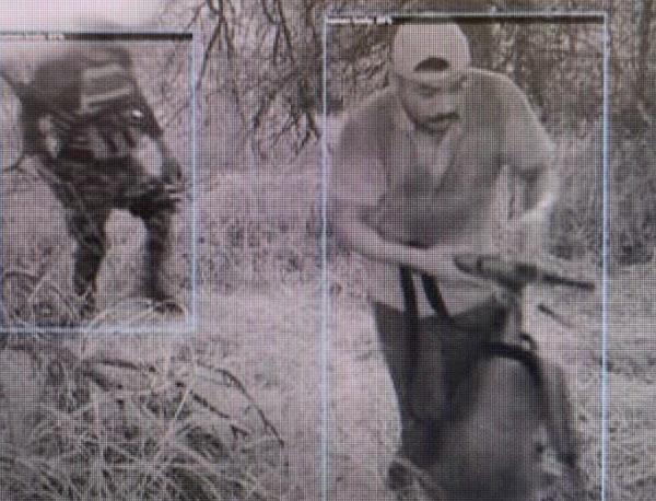 Surveillance footage shows the men.