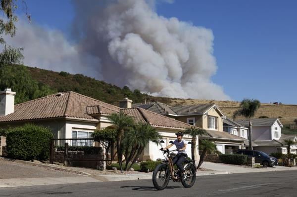The fire could've been seen from residential areas as it co<em></em>ntinues to burn in Trabuco Canyon, California, USA, 10 September 2024. 