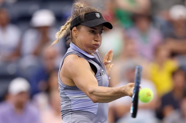 Yulia Putintseva returns serve during Saturday's match.