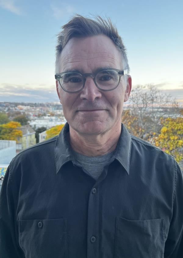 Rabbi Andy Bachman, a middle-aged man with glasses.