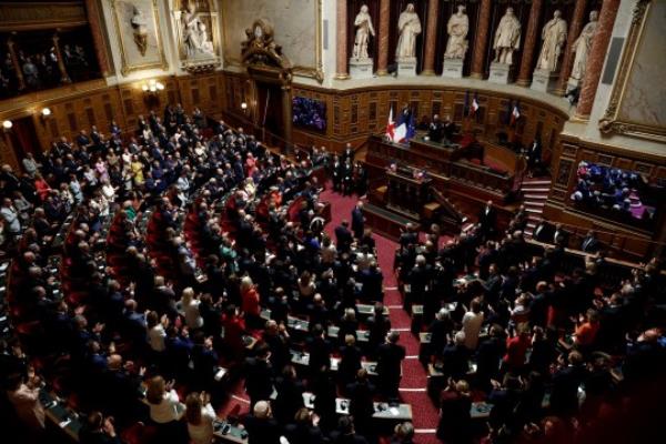 Britain's King Charles is applauded by members of parliament after he delivered his speech at the French Senate in Paris, on the second day of his State visit to France, September 21, 2023. REUTERS/Benoit Tessier